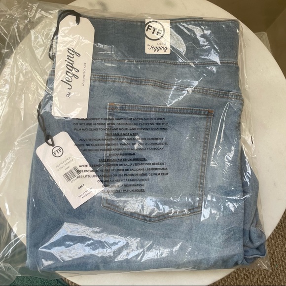 Medium Wash High Rise Destructed Jeggings Short Inseam | Fashion To Figure - Picture 5 of 7